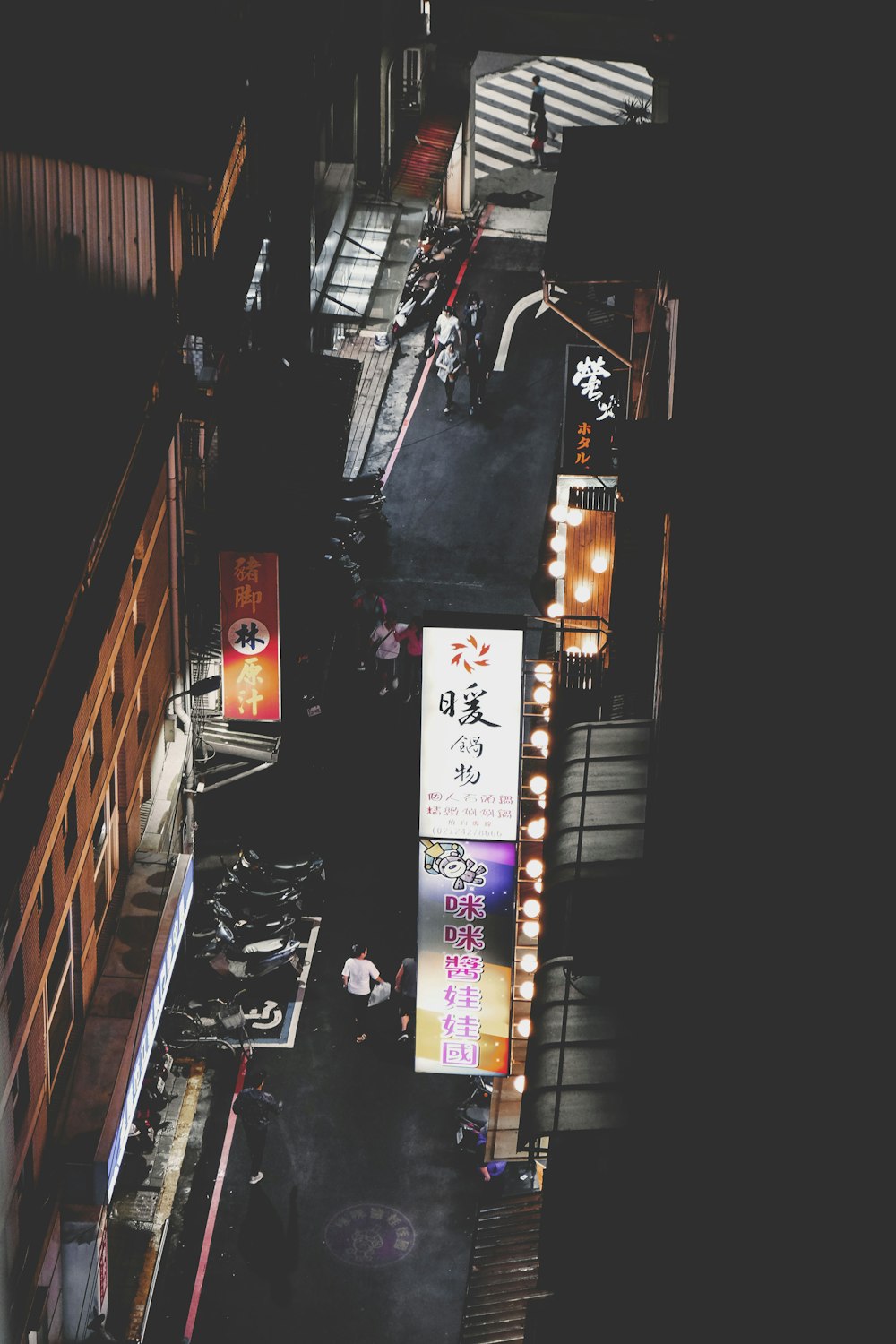 lighted store signage during nighttime