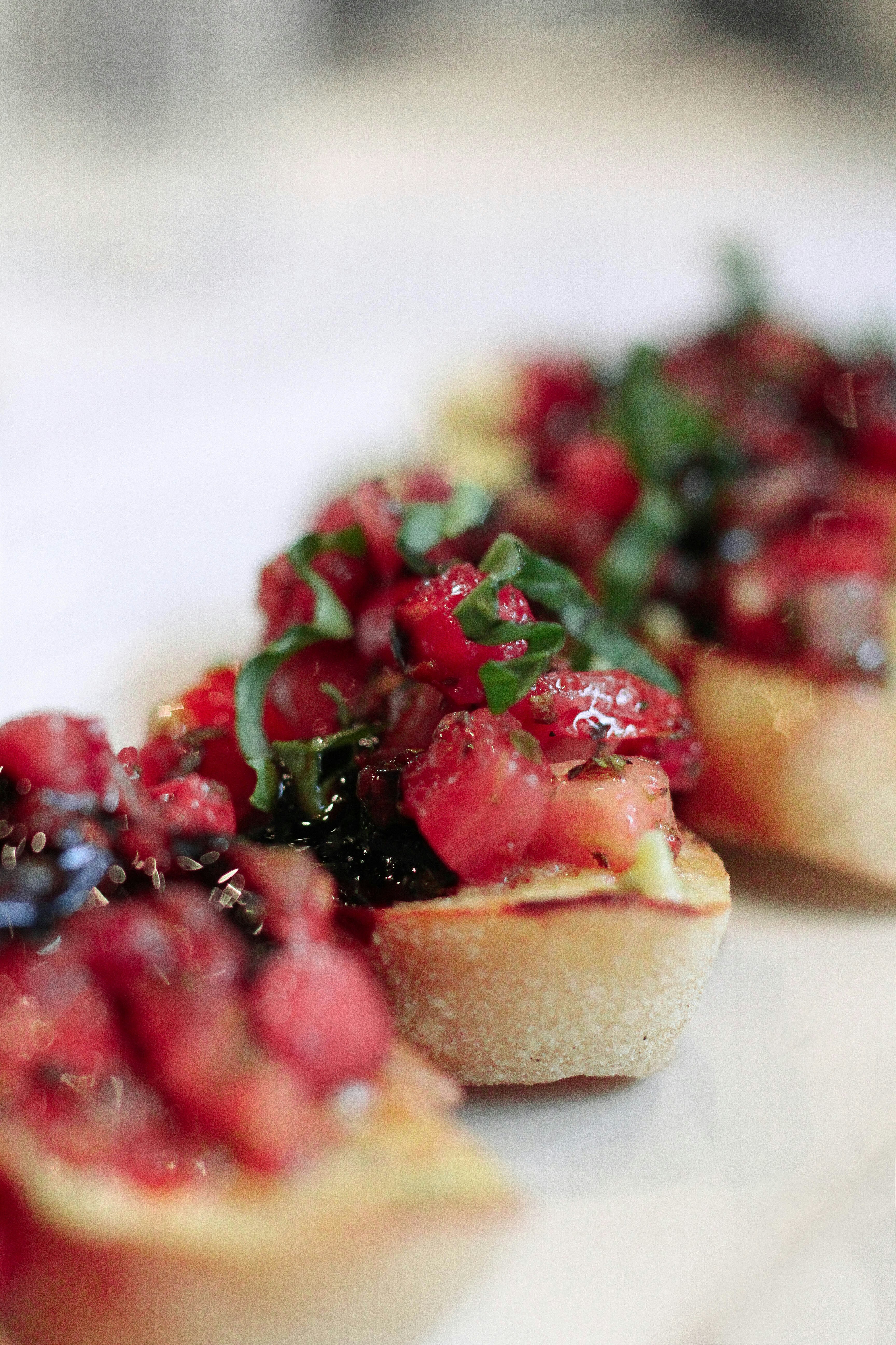 Rustic bruschetta with diced tomatoes and fresh basil on toasted sourdough bread