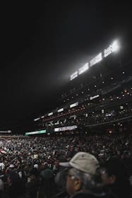 A packed stadium under bright lights during a major sports event.
