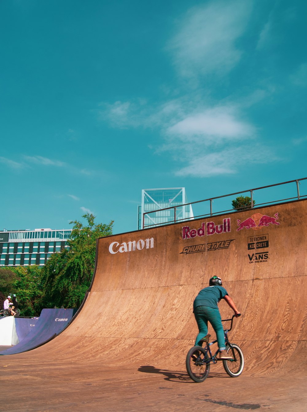 man riding bicycle in a ramp