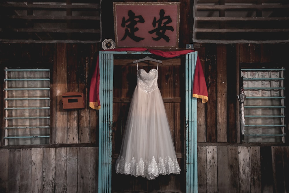 women's white and gray floral spaghetti-strap wedding dress