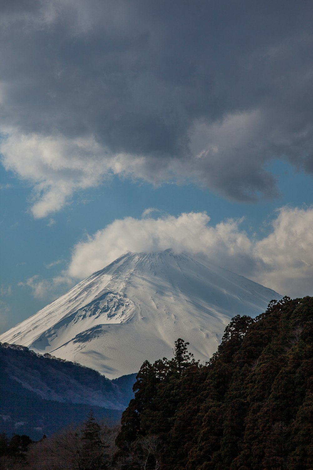 snow covered mountain during daytime