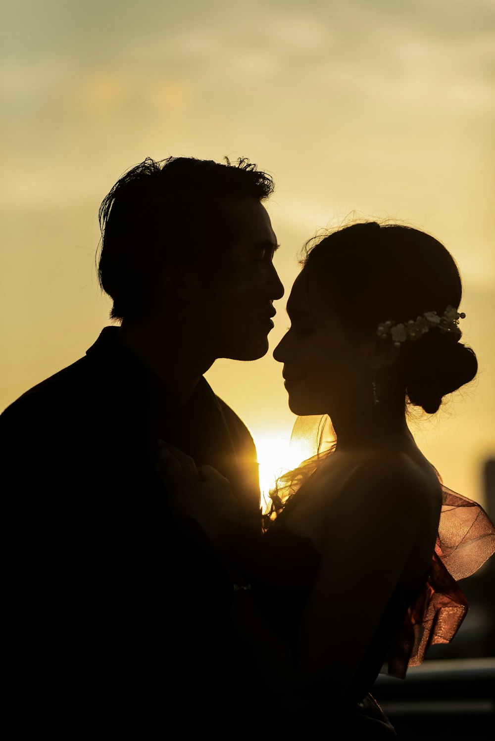 man and woman hugging each other