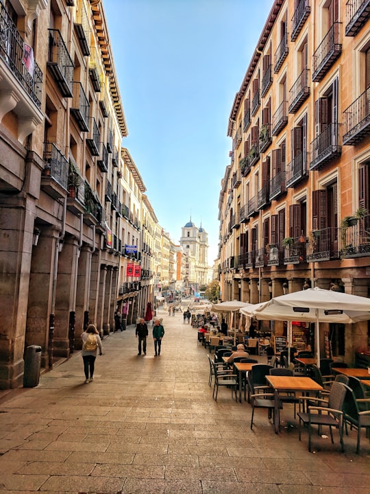 people in a street during daytime in Plaza Mayor Spain