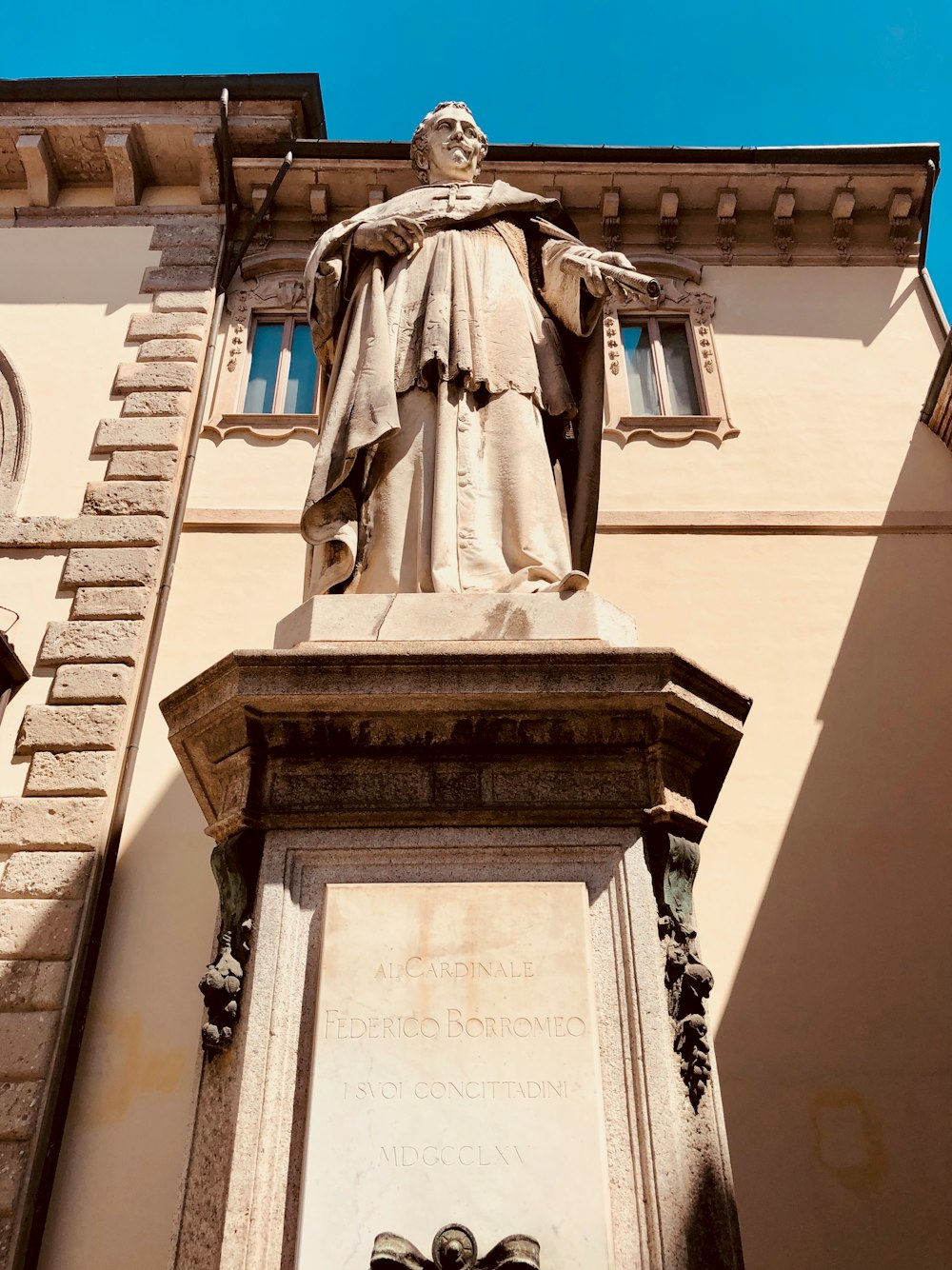 low-angle photography of a statue of man