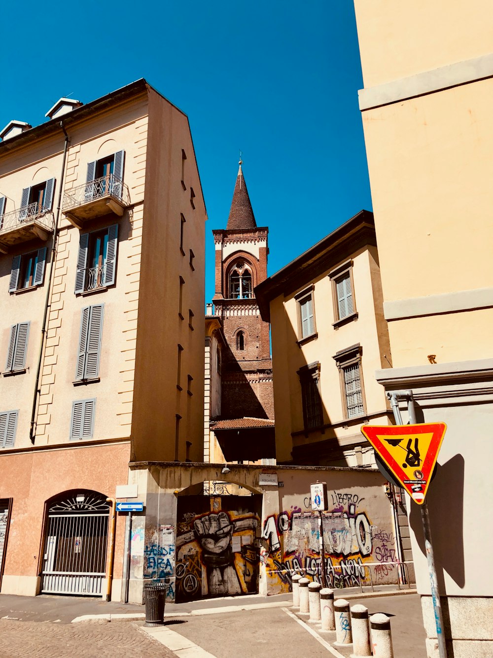 brown and yellow concrete building during daytime