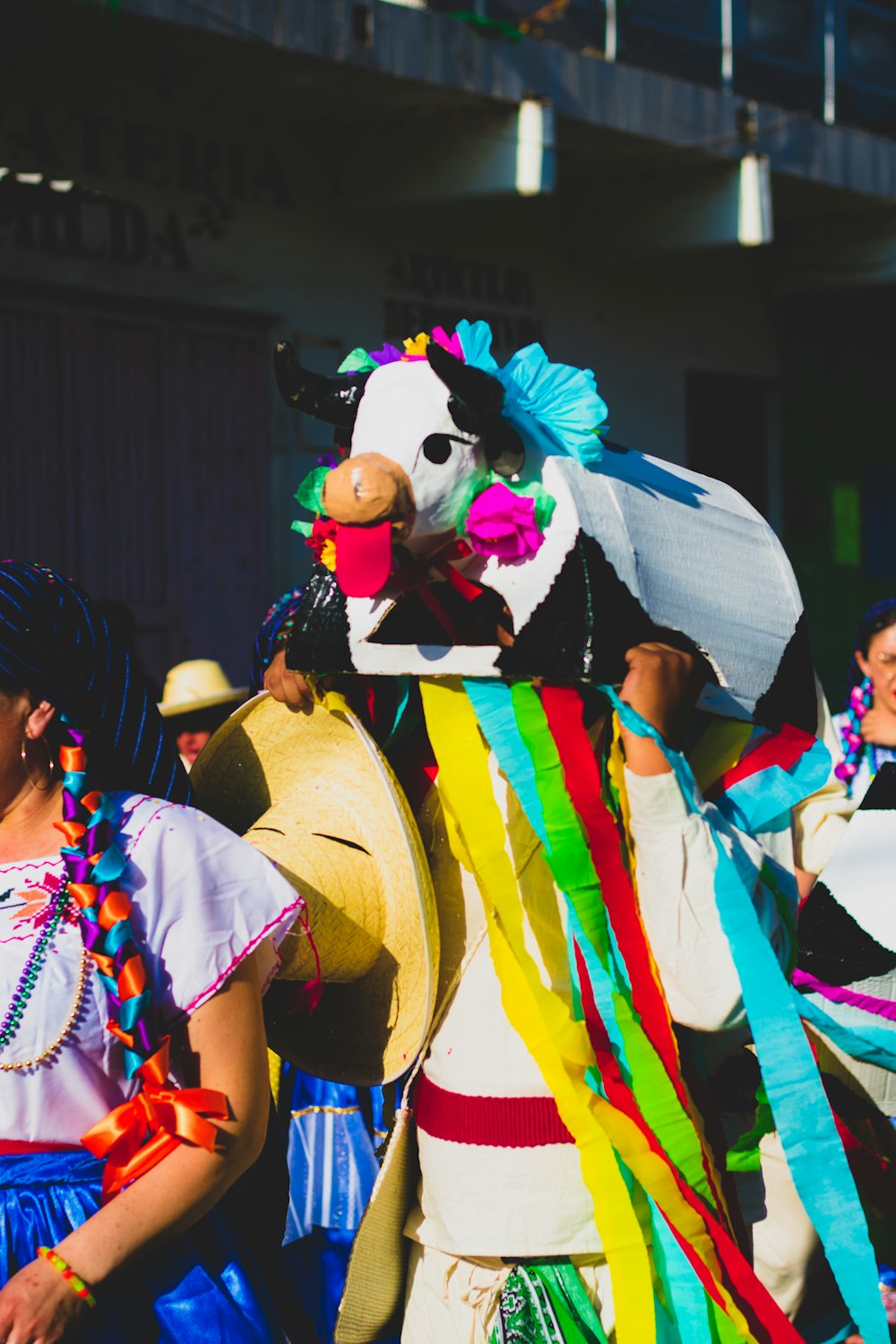 person wearing cow mask during daytime