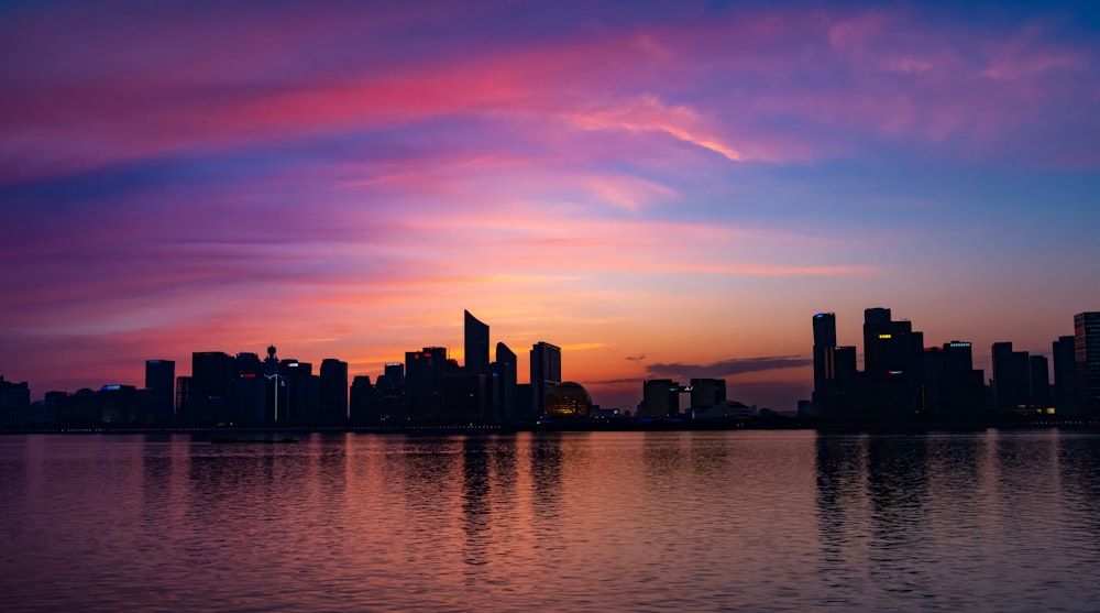 high-rise building near body of water