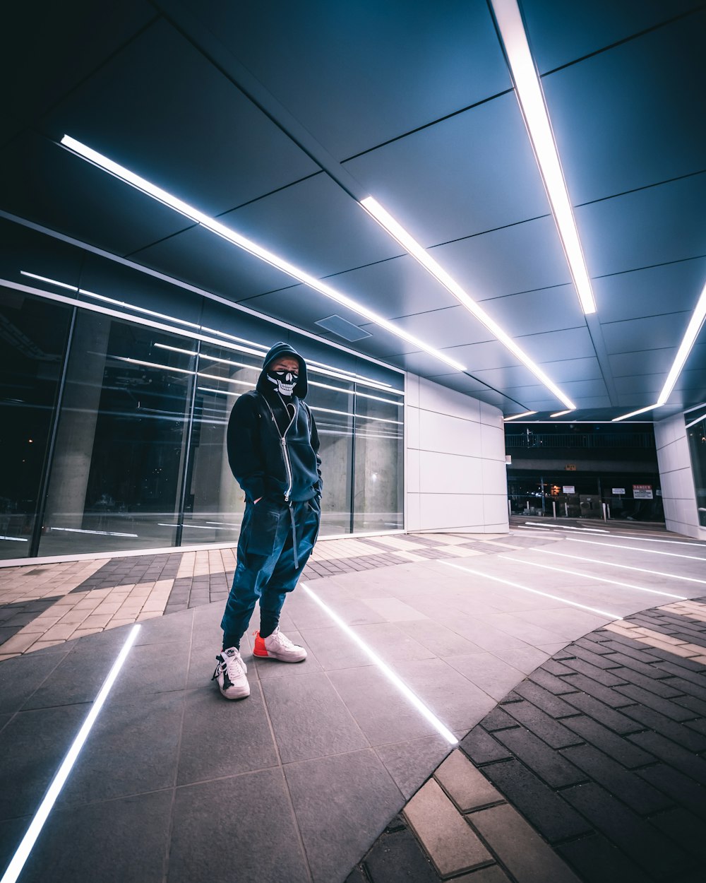 man standing near building