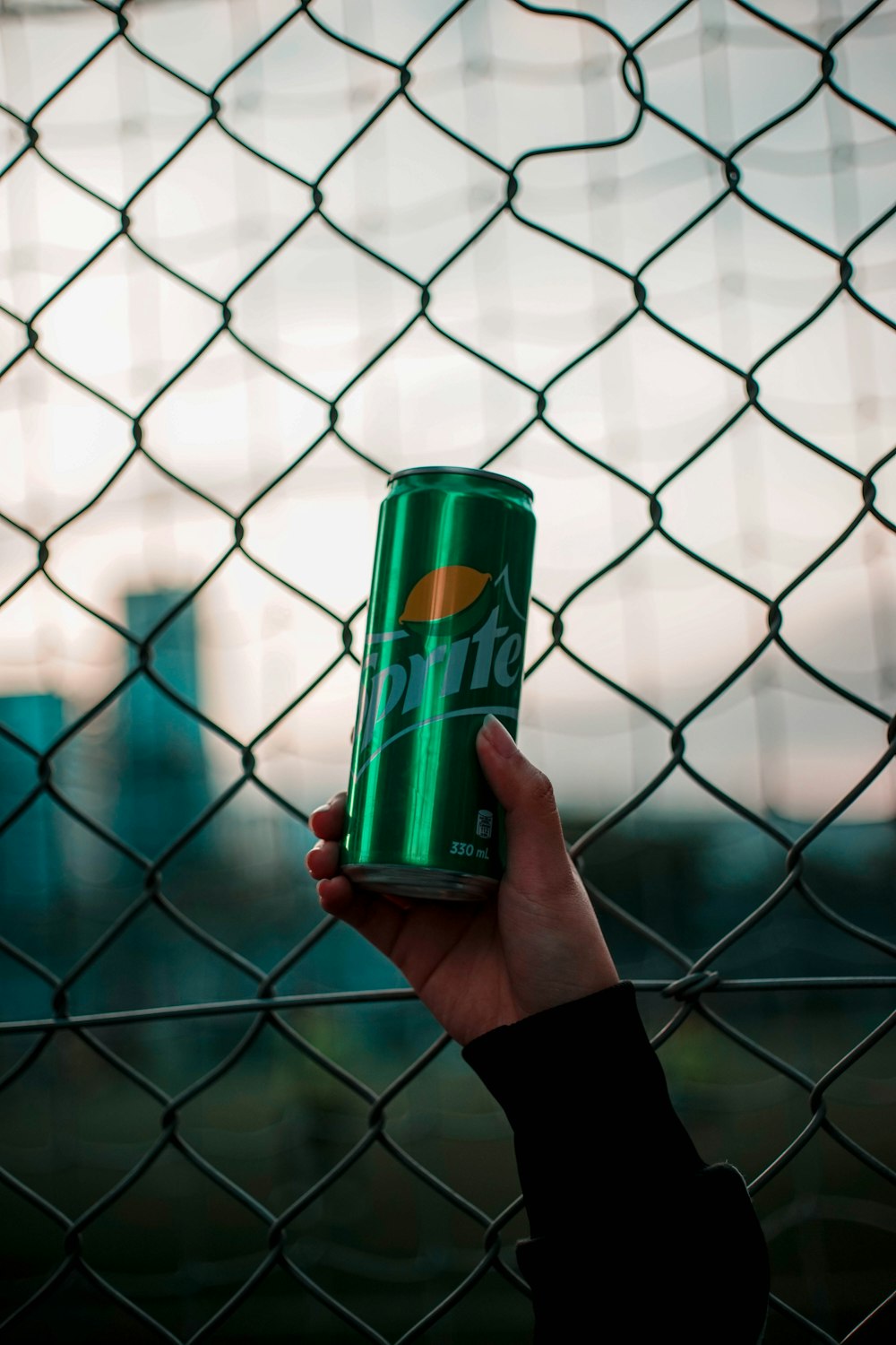 shallow focus photo of Sprite soda can