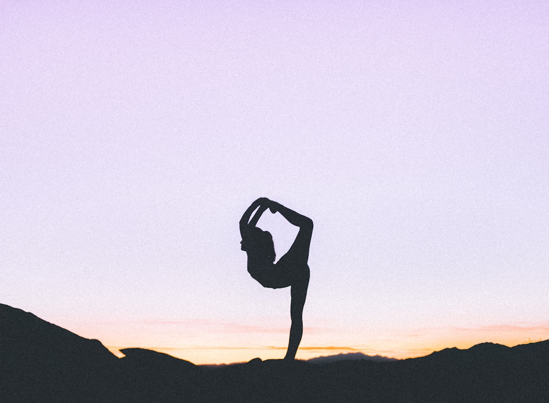 woman standing with her one leg