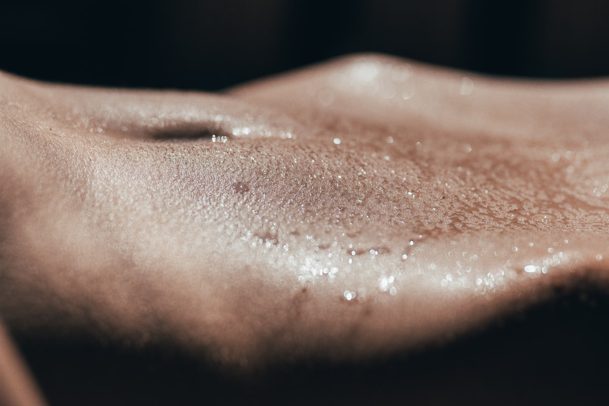 A close-up of smooth, evenly lit human skin
