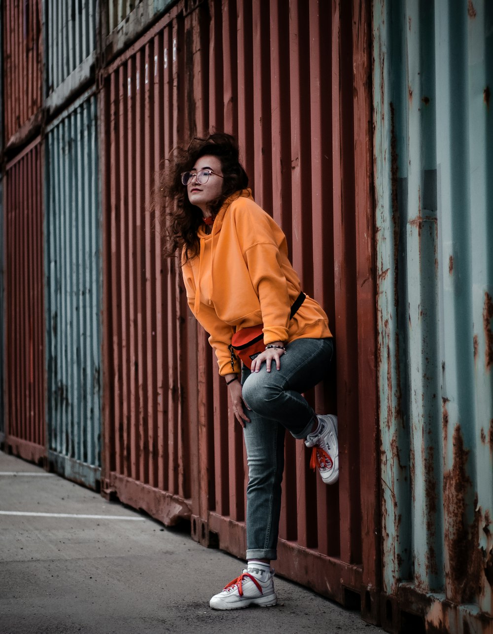 woman wearing orange hoodie