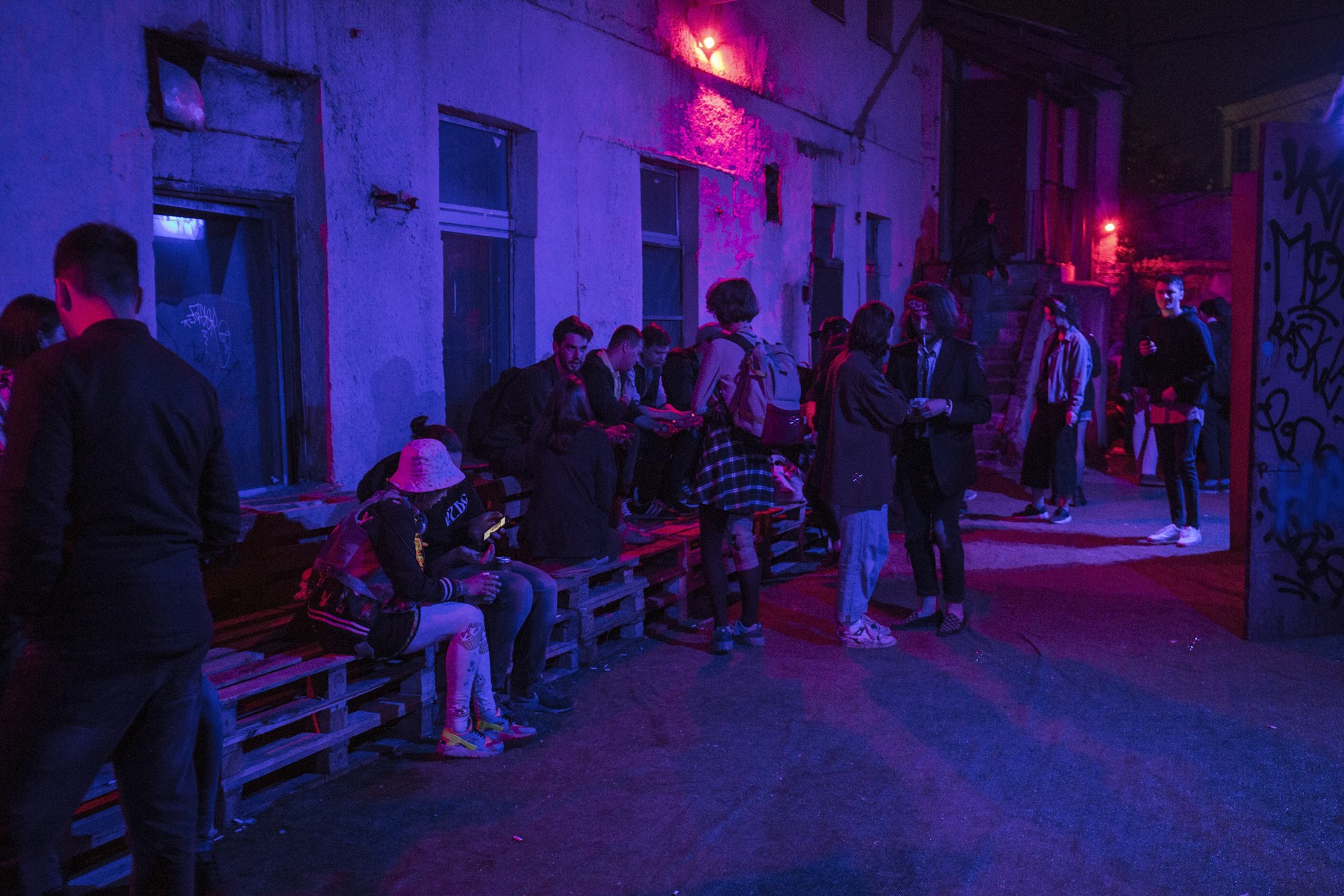 people sits on wooden pallets