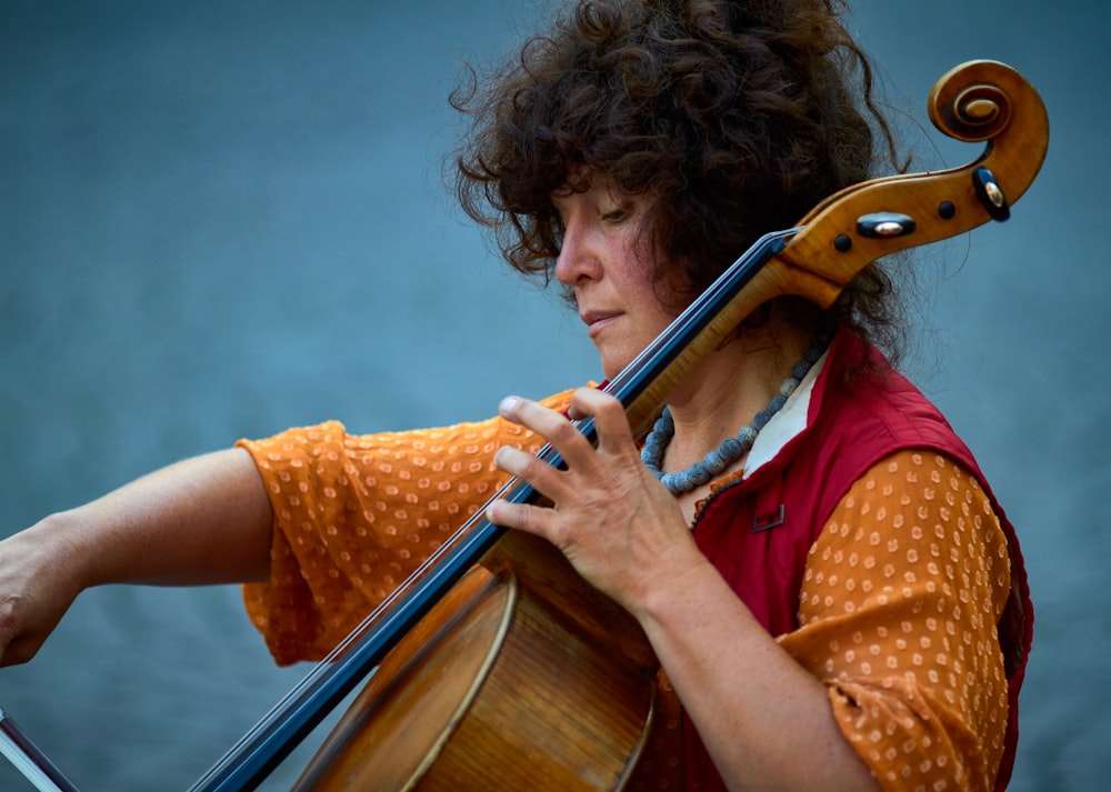 woman plays cello