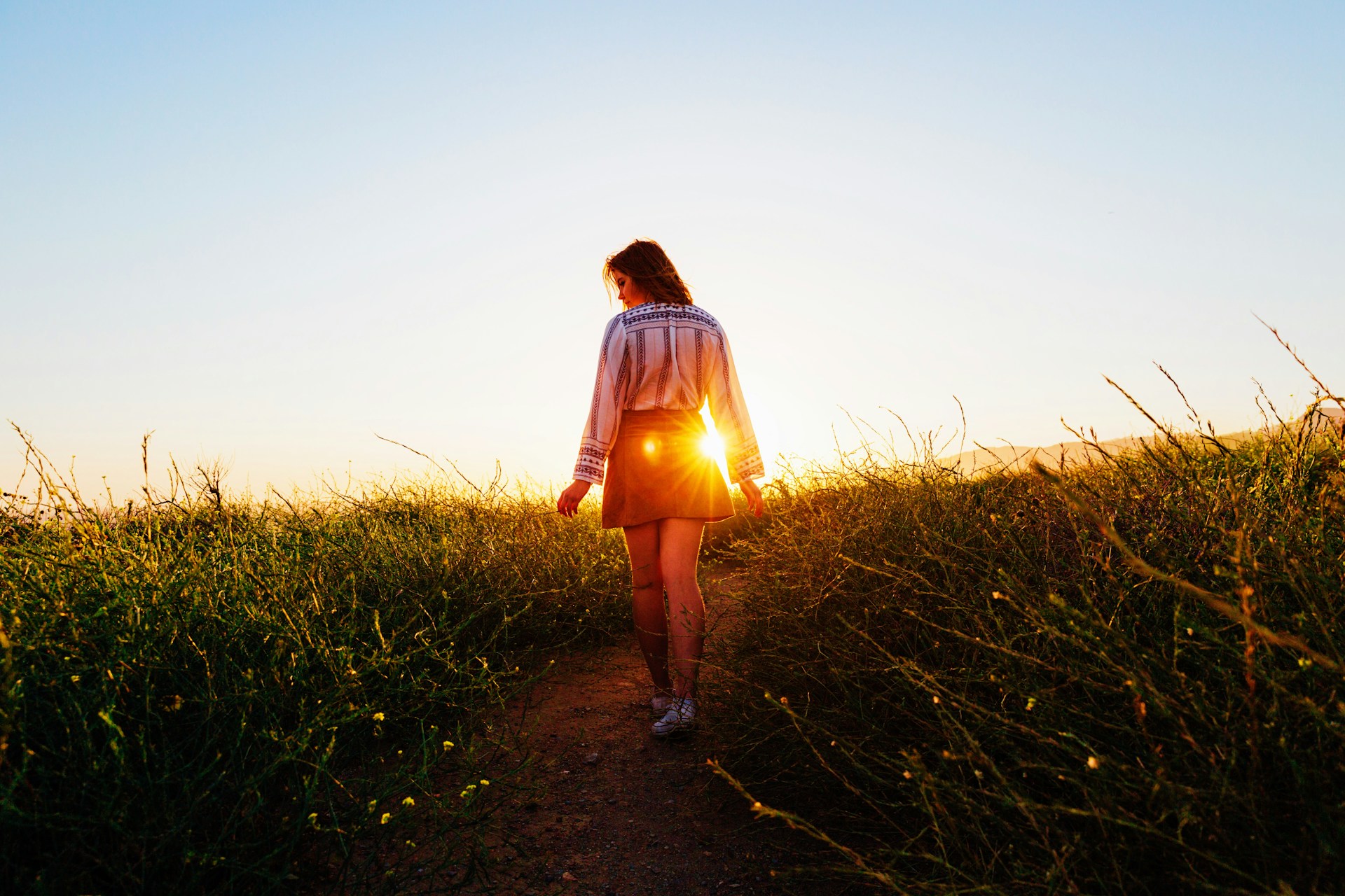woman walking on pathway
