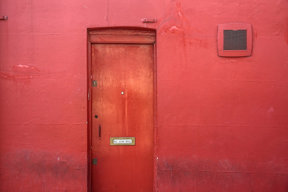 closed red metal door
