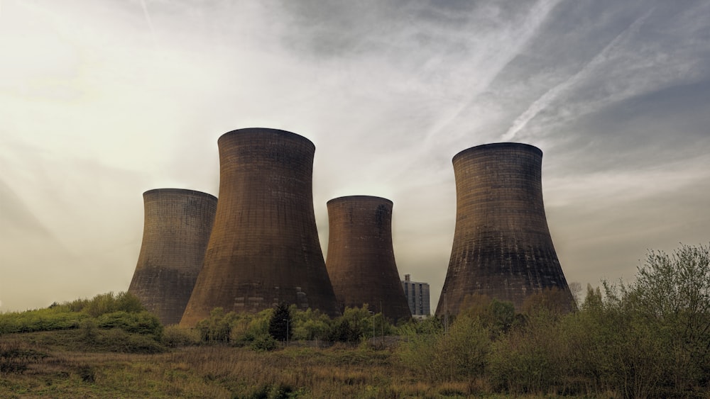 four brown concrete towers