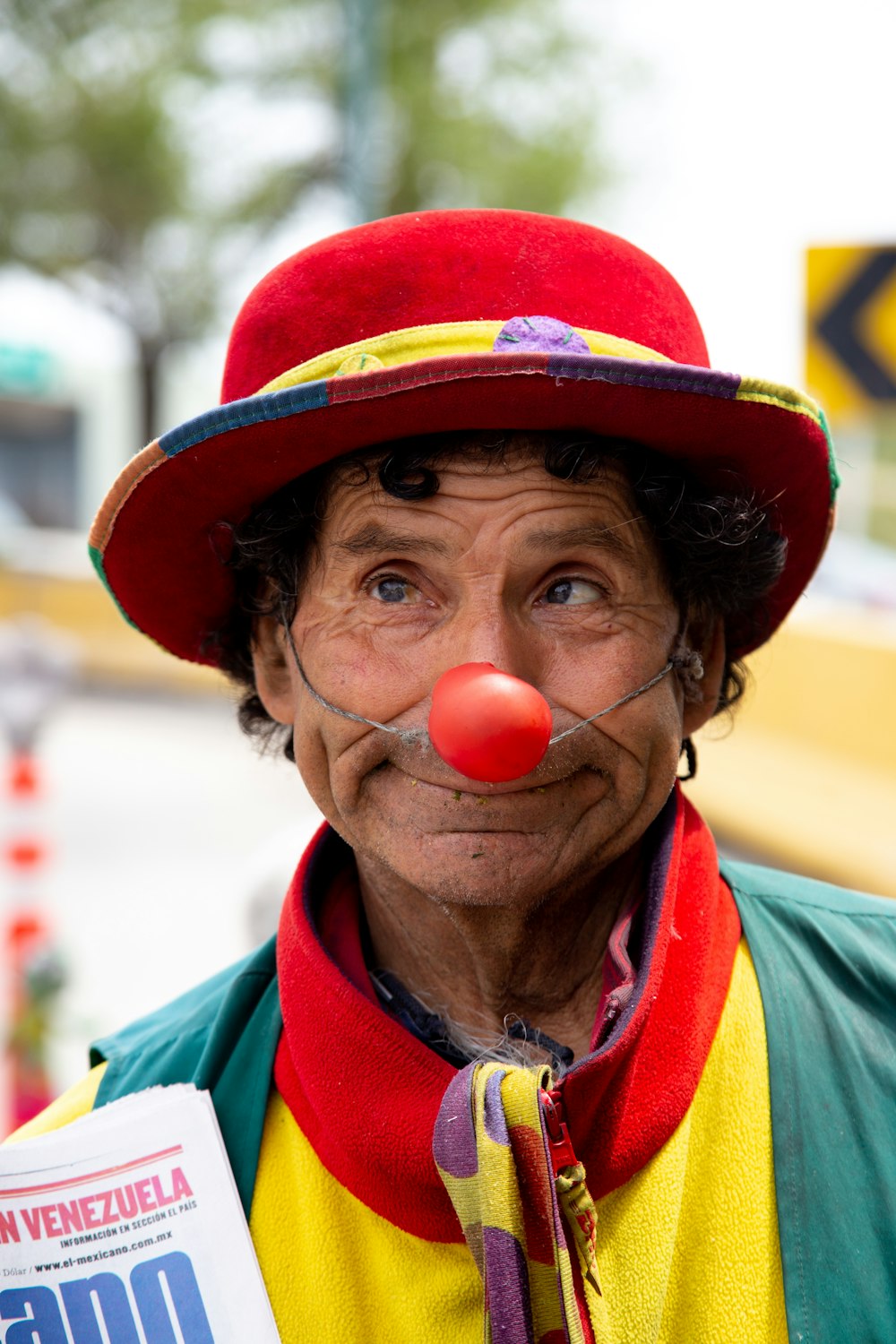 man as clown during daytime