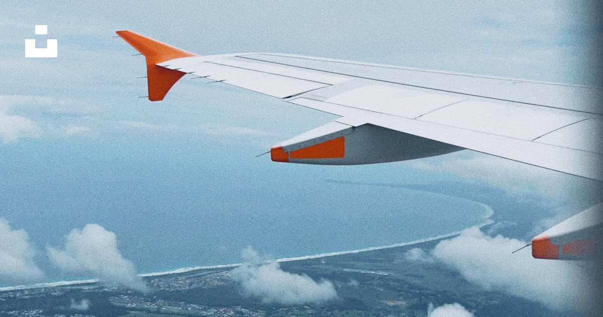 White airplane flying during daytime photo Free Flight Image on Unsplash