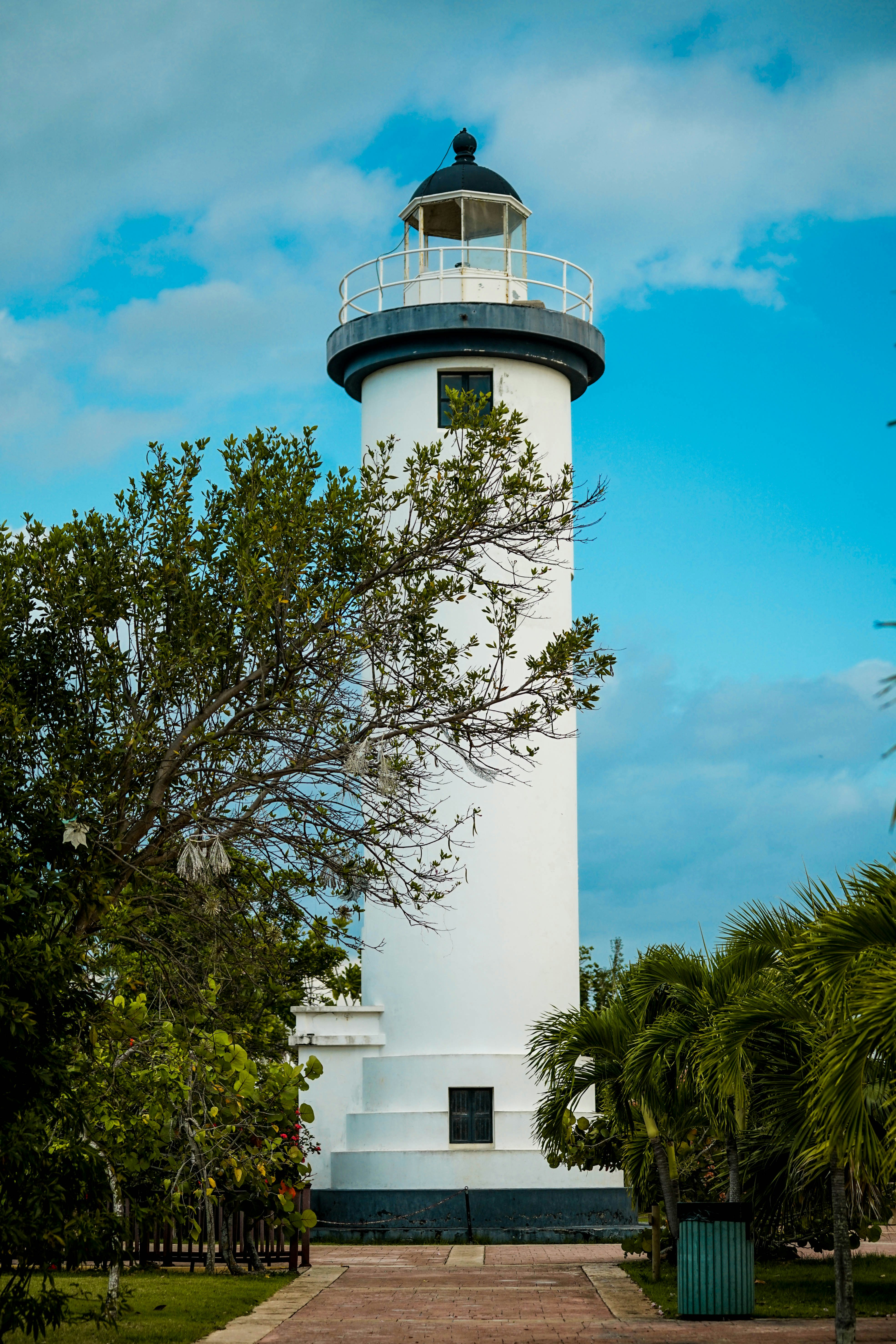 white lighthouse under blue sky