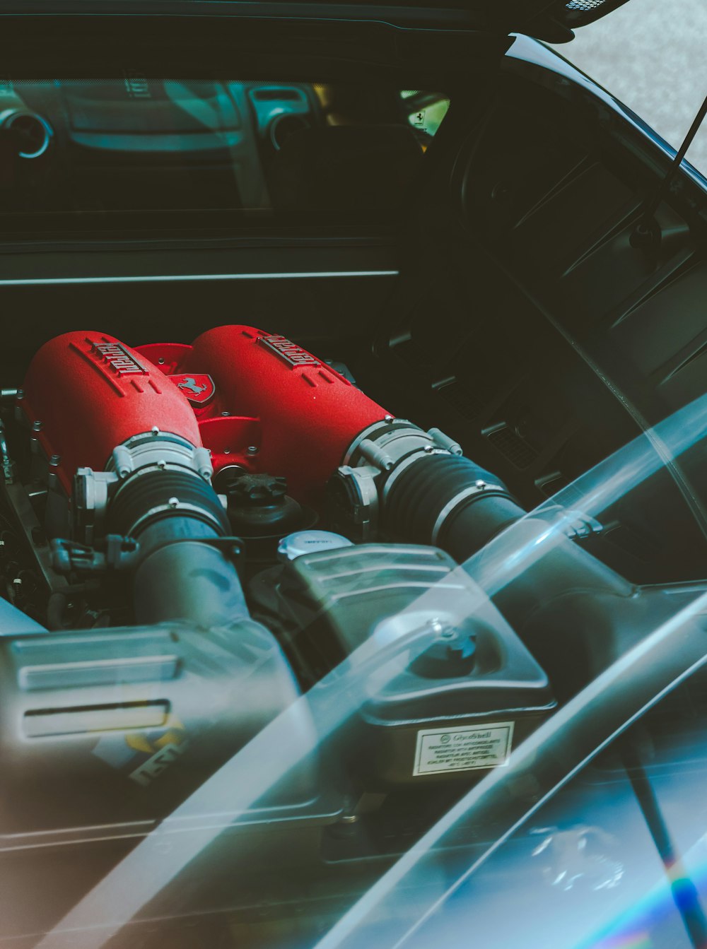 red and black vehicle engine bay