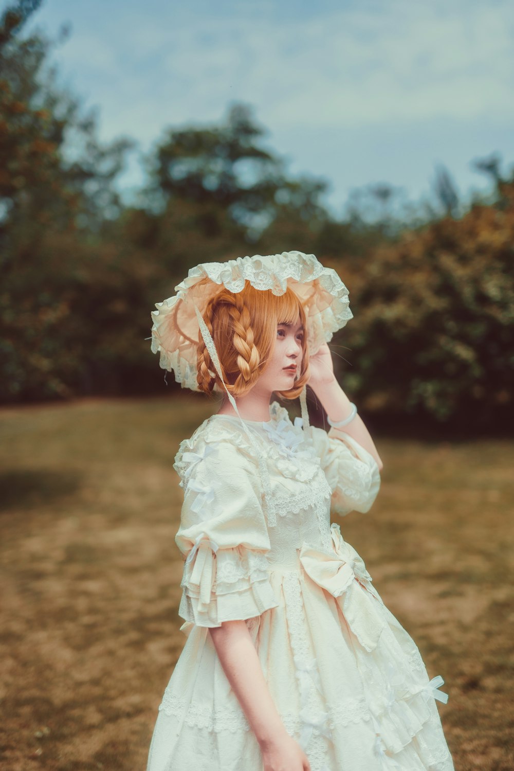 woman wearing white dress