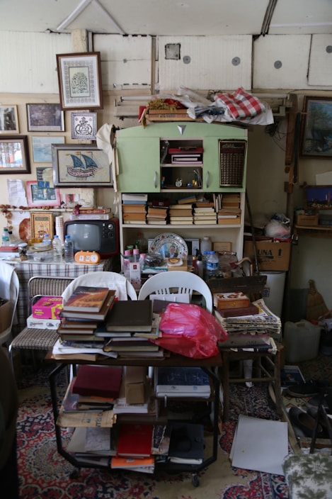 Cluttered room, despair, mess, unordered, lost, unmanageable, jumble, no space, chaos, muddle, house