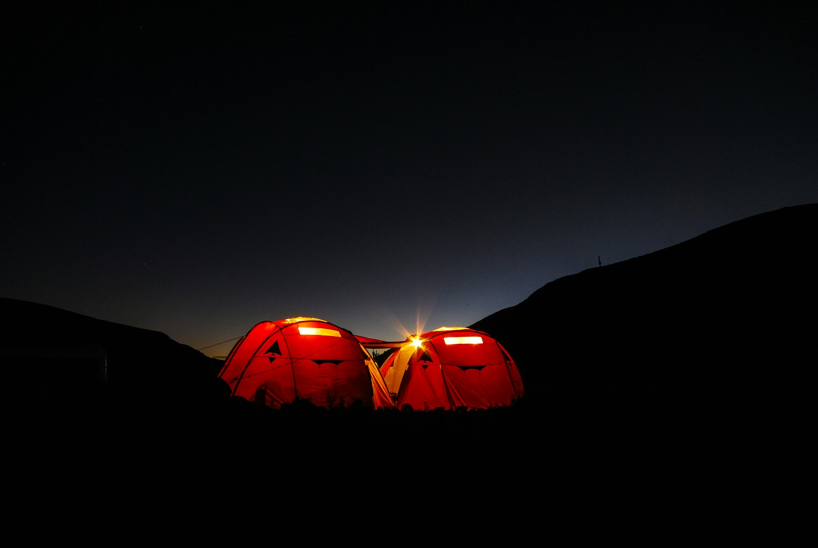 Sigma 10-20mm F4-5.6 EX DC HSM sample photo. Two red tents during photography