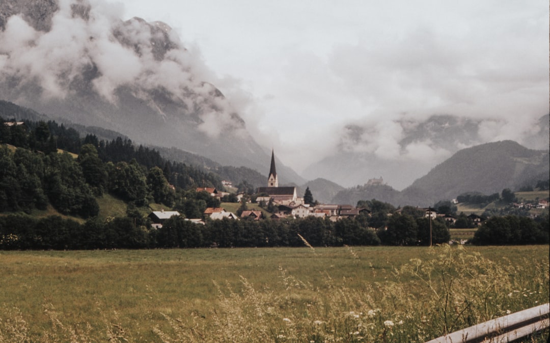 white and black building near mountain