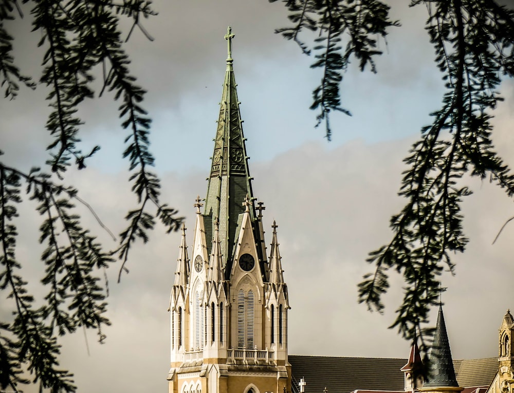 white and green church steeple