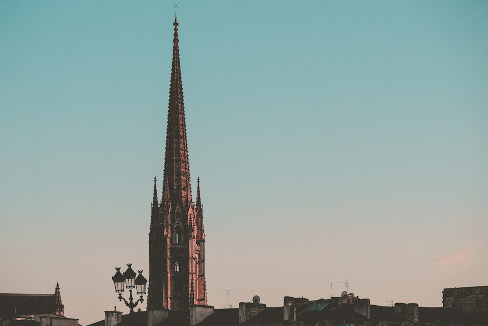 a tall tower with a clock on top of it