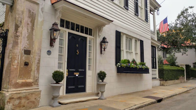 Close-up of a freshly painted door and well-maintained property exterior.