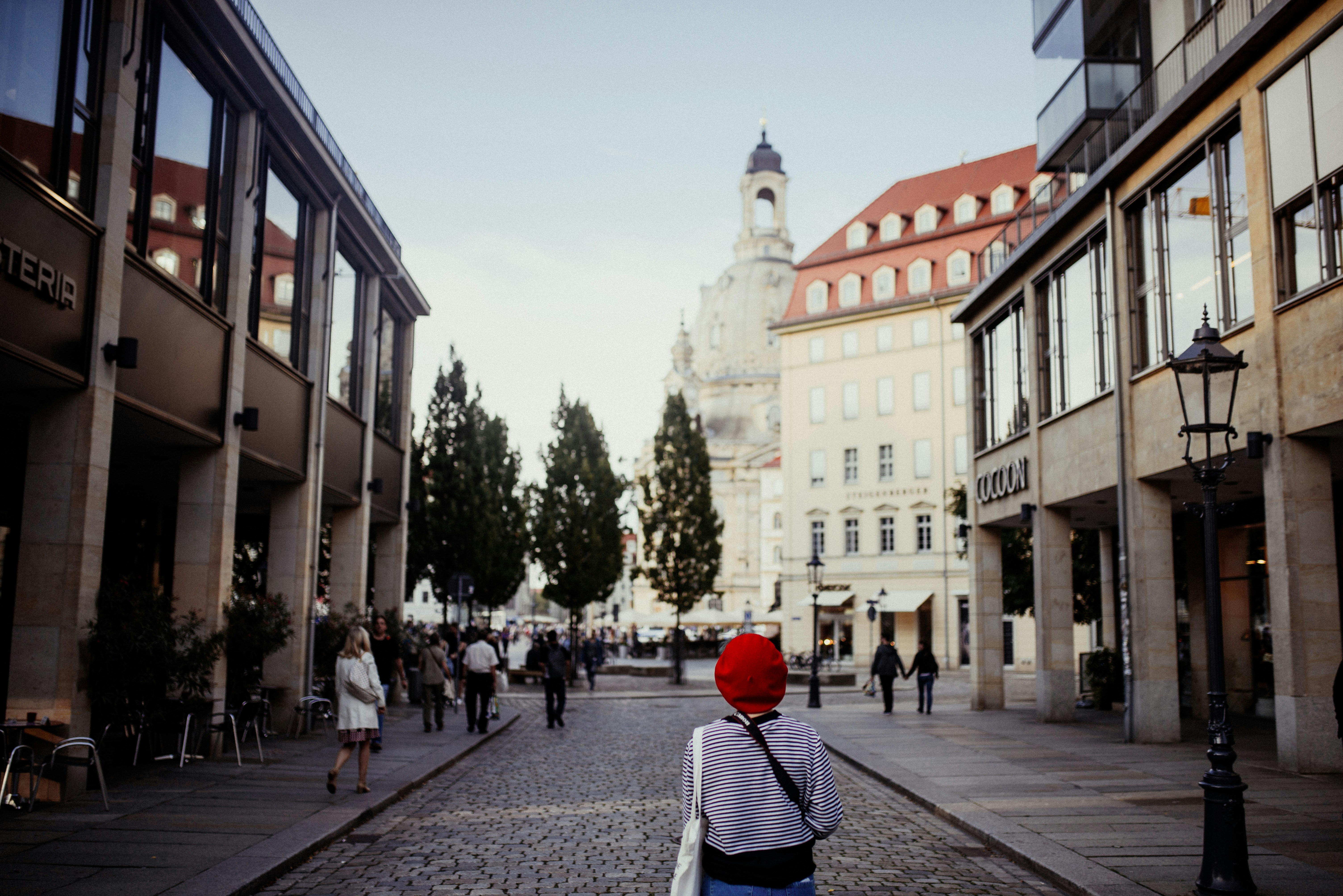woman walking near the building, 