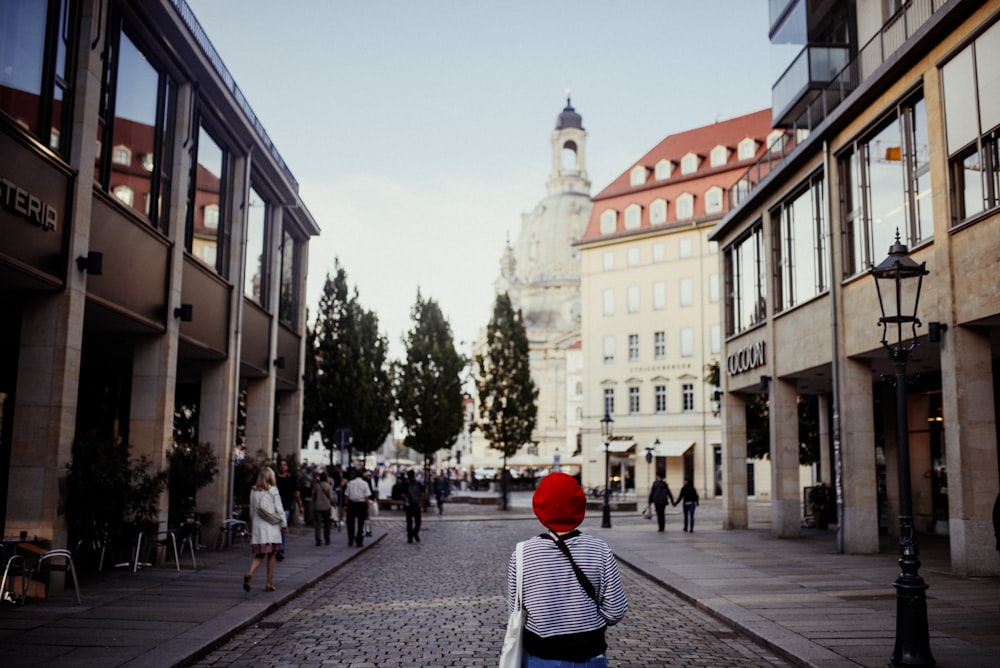 woman walking near the building