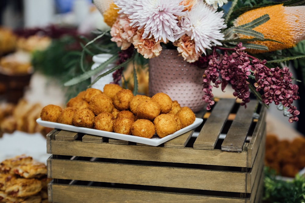 brown meatballs in white tray