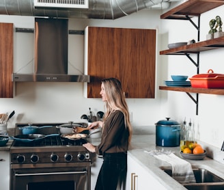 woman holding brown spatula