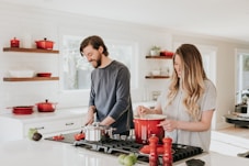 man and woman on kitchen