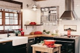 Renovated farmhouse kitchen combining rustic charm with modern fixtures