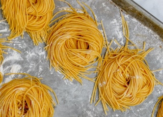 yellow noodles in tray