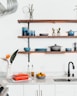blue ceramic dinnerware on rack
