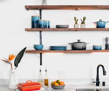 blue ceramic dinnerware on rack