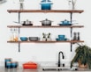 cookware set on floating shelves