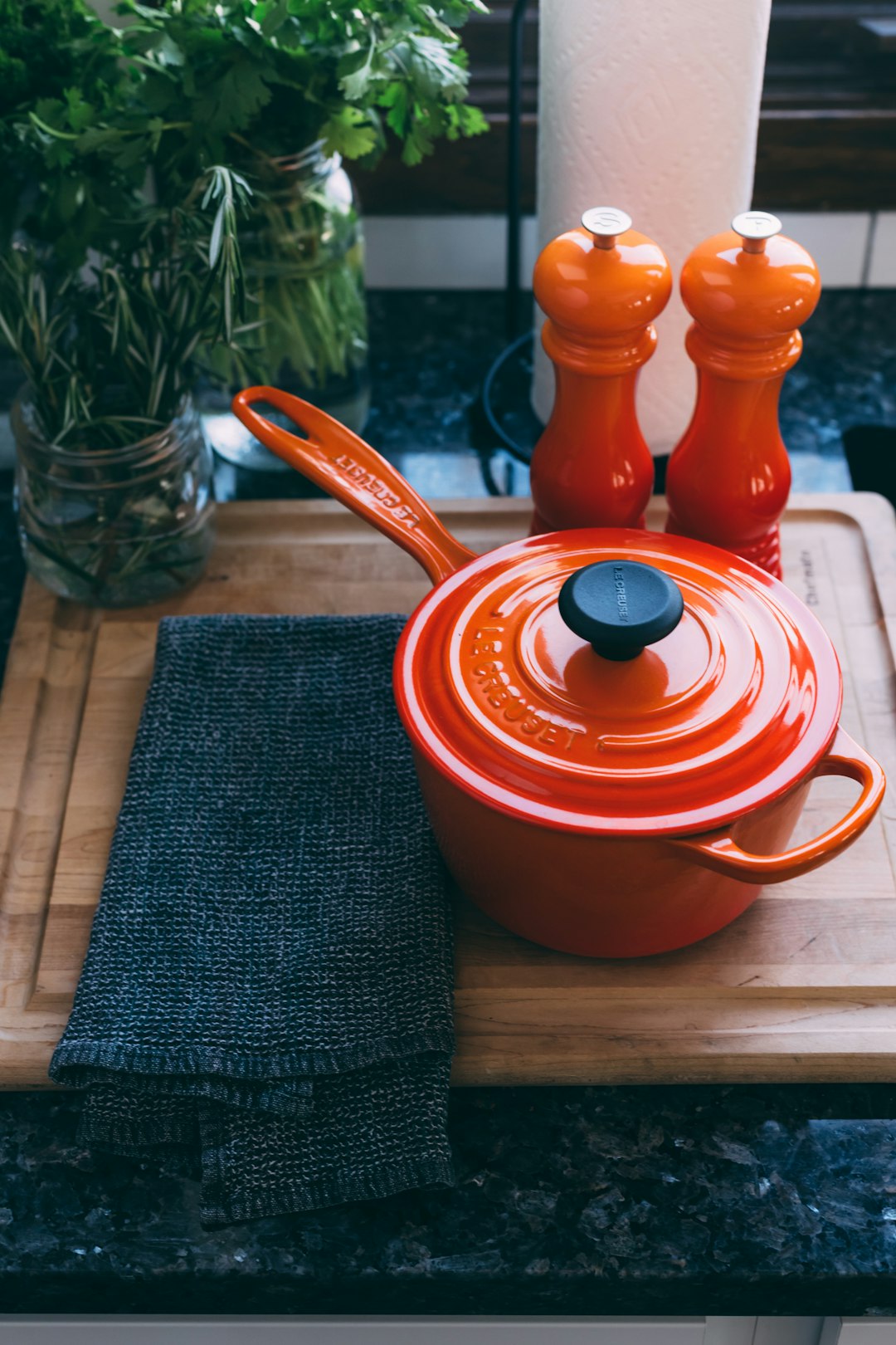  round orange pot pot container utensils