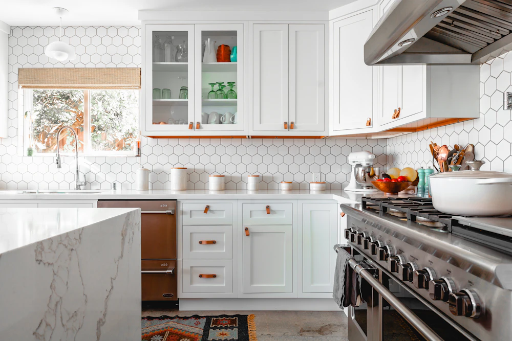 Clean kitchen install with stainless range and hood