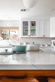two cooking pots on kitchen island