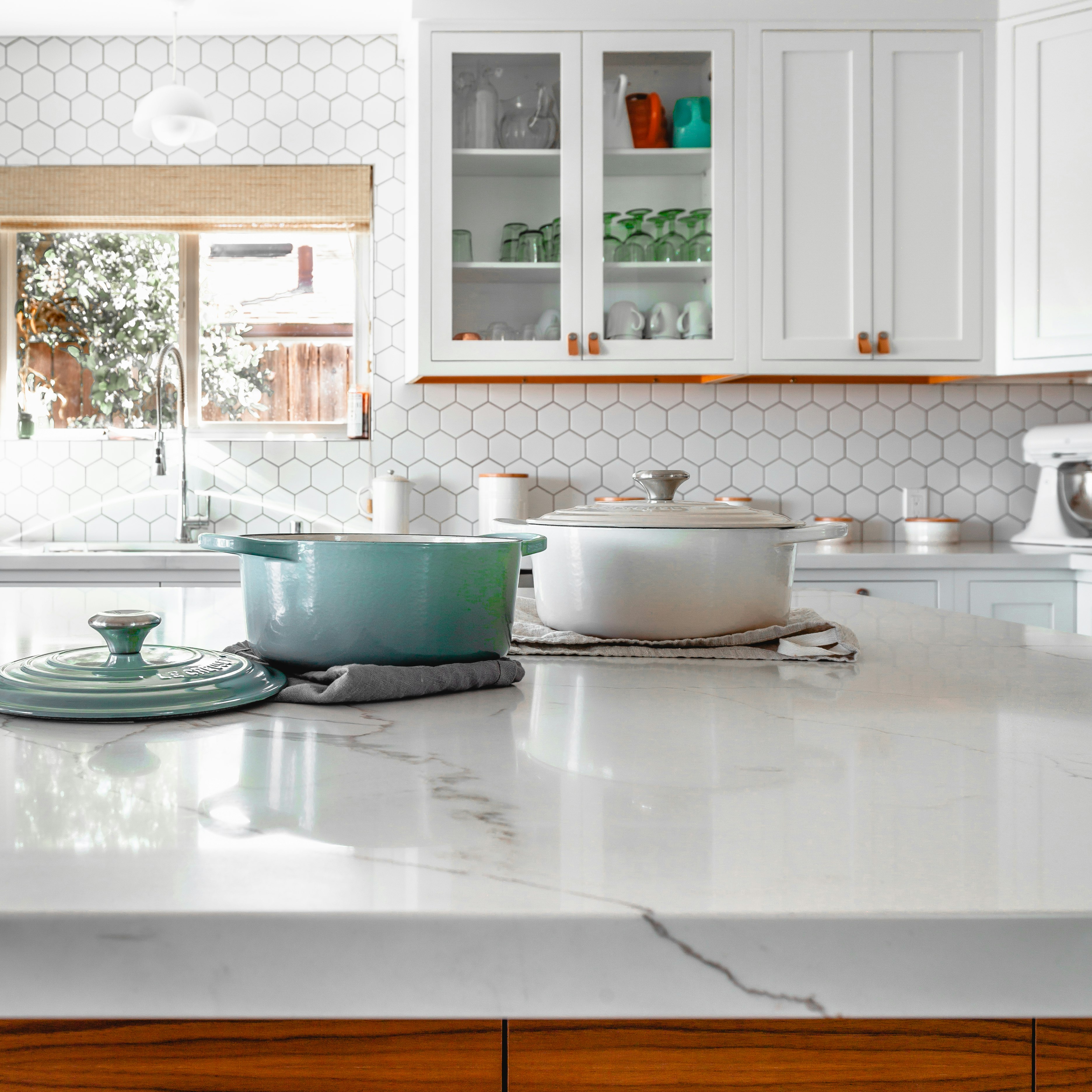 two cooking pots on kitchen island