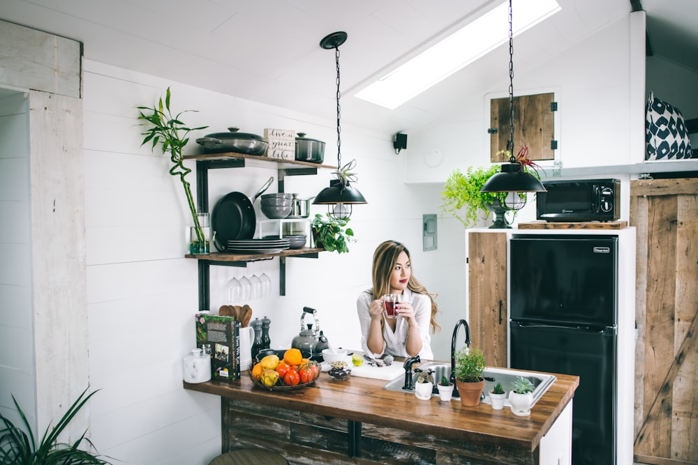 woman sitting in front of table