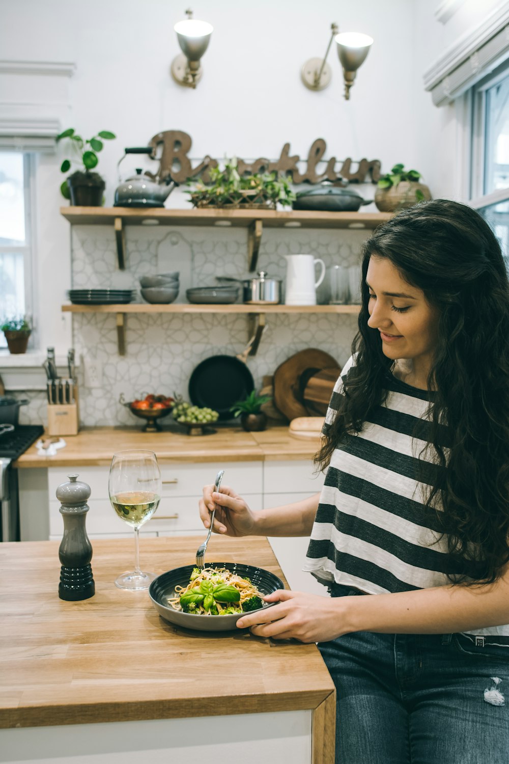 woman sitting in front of table