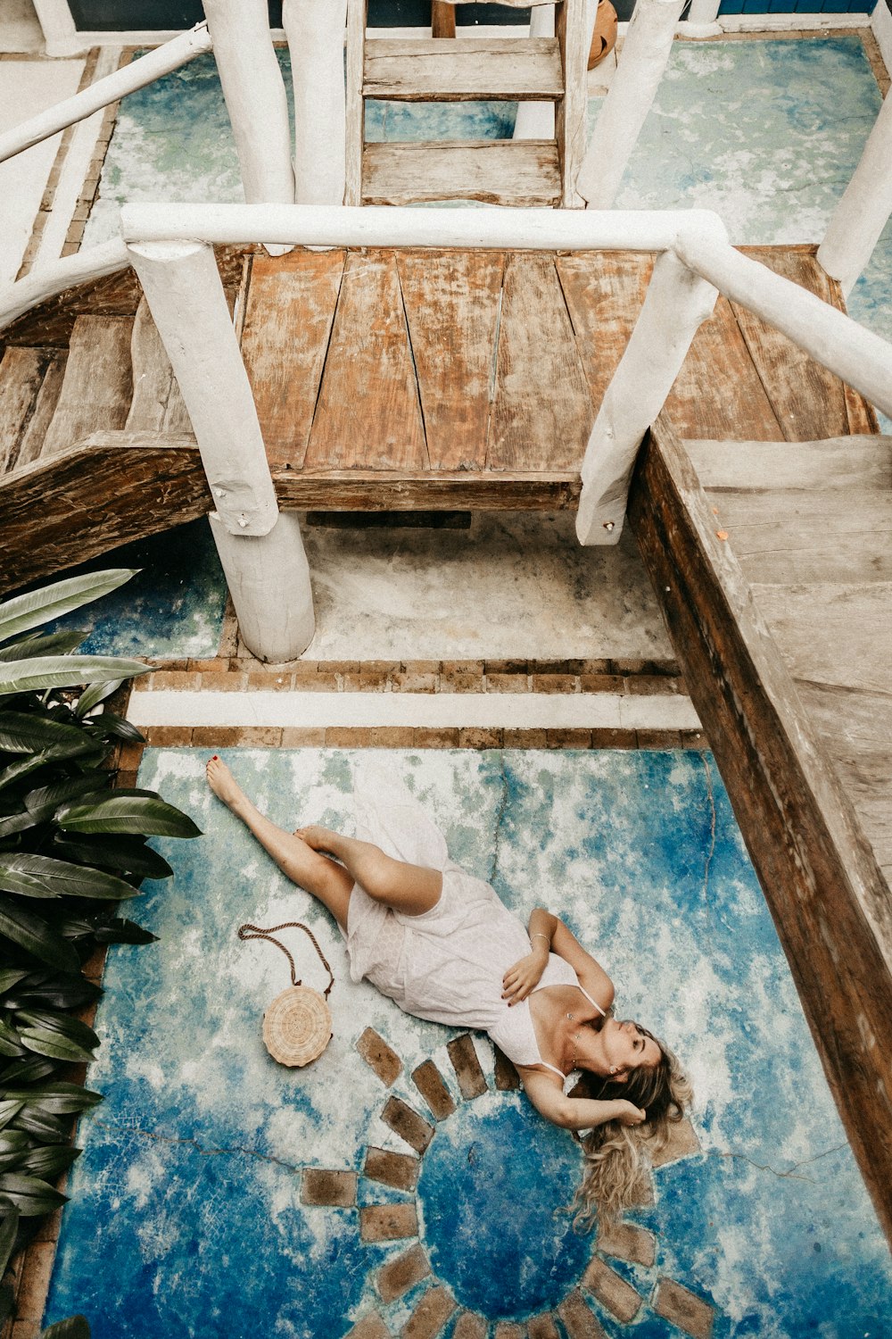 woman lying on area rug